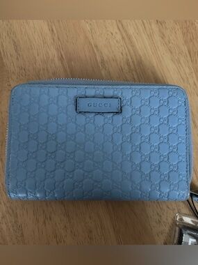 Gucci Sky Blue Embossed GG Zip Around Wallet